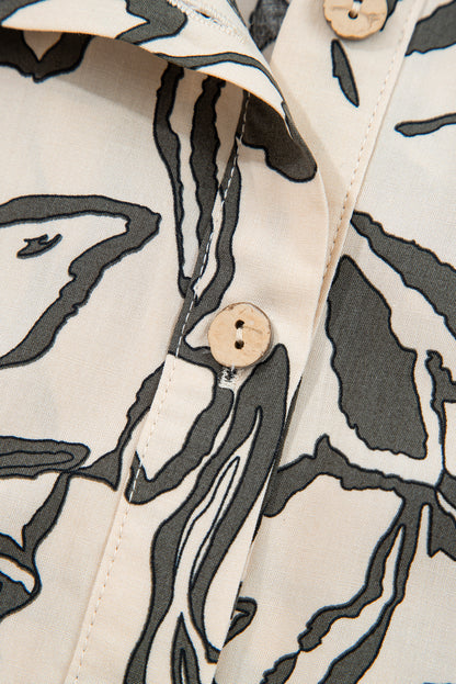 Losse blouse met bloemenprint vleermuismouwen en knoopsluiting