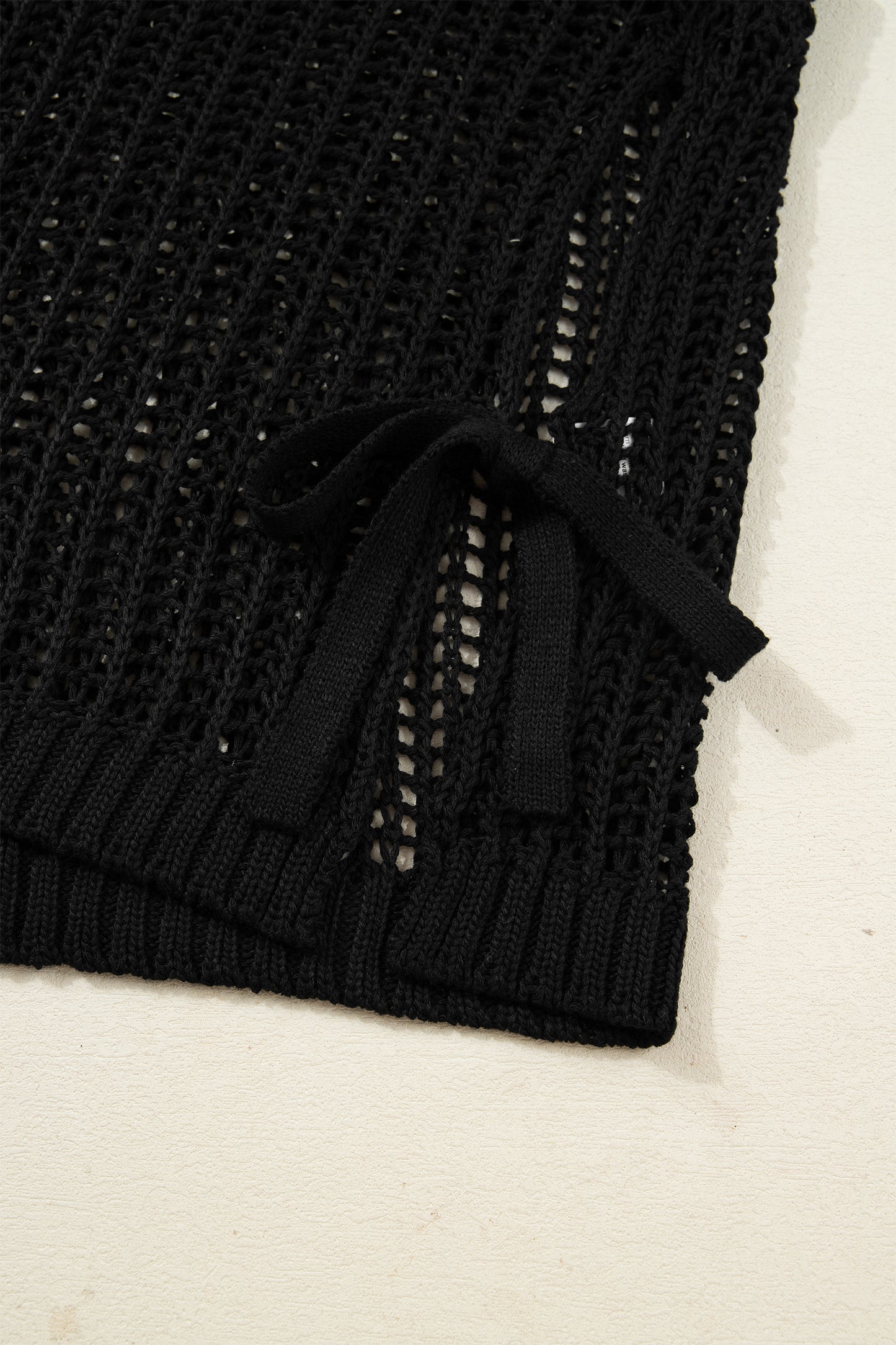Plus size open gebreide trui met strik en korte mouwen