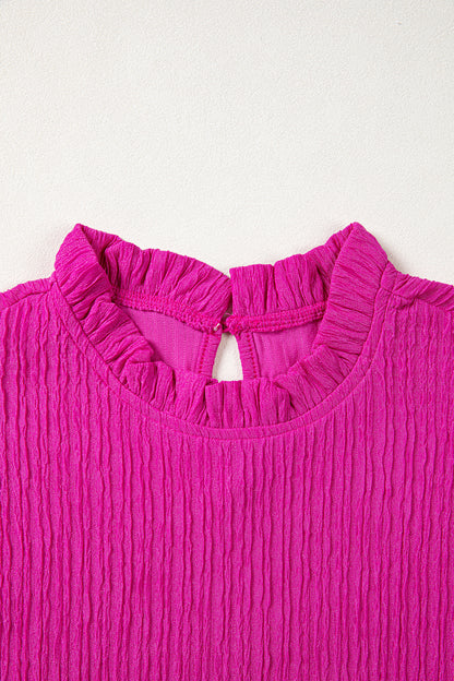 Effen blouse met textuur en ruches korte mouwen