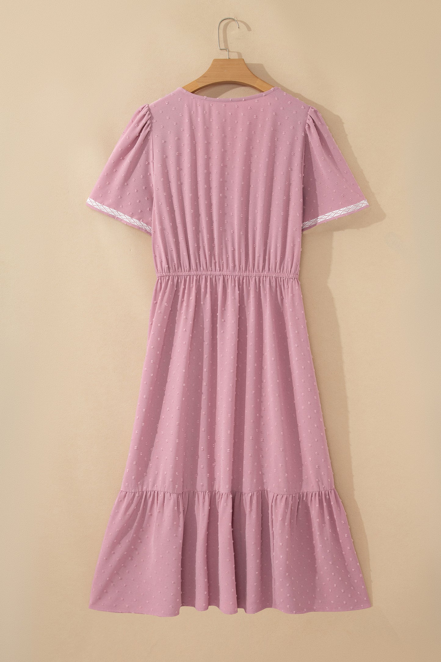 Roze plus size jurk met stippen korte mouwen smockwerk hoge taille en zwierige rok