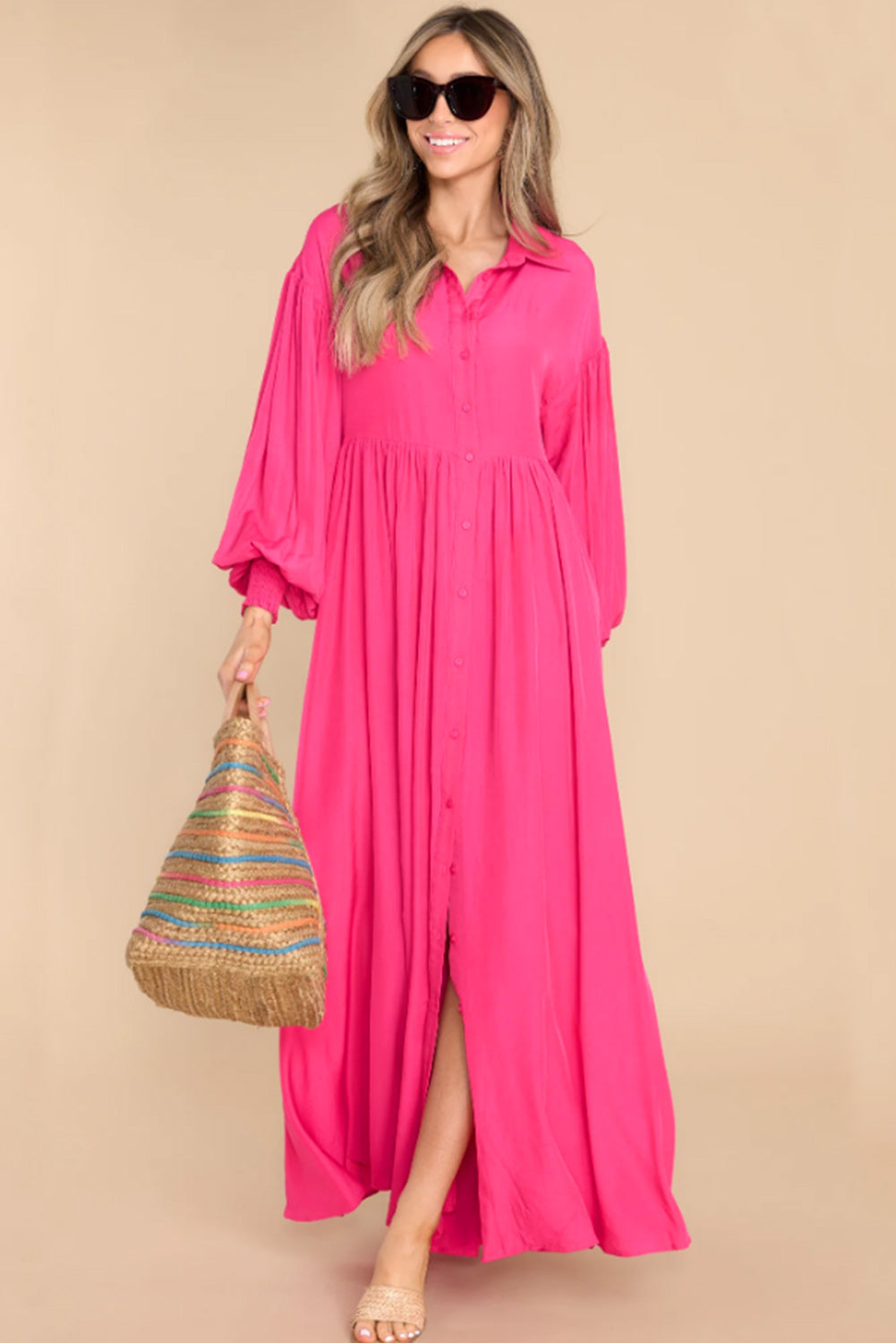 Roze maxi-jurk met ballonmouwen
