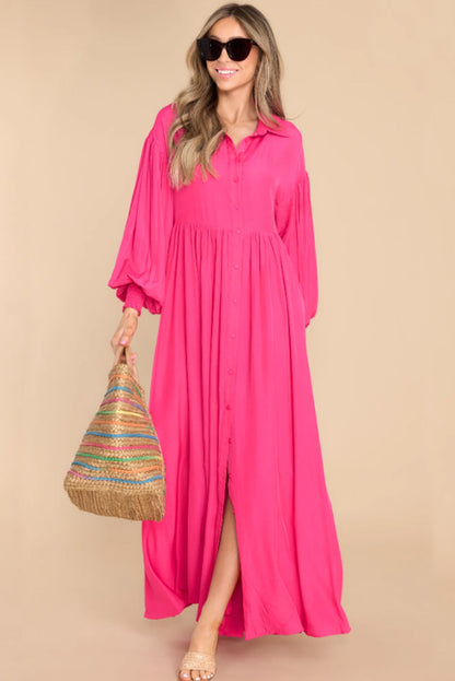 Roze maxi-jurk met ballonmouwen