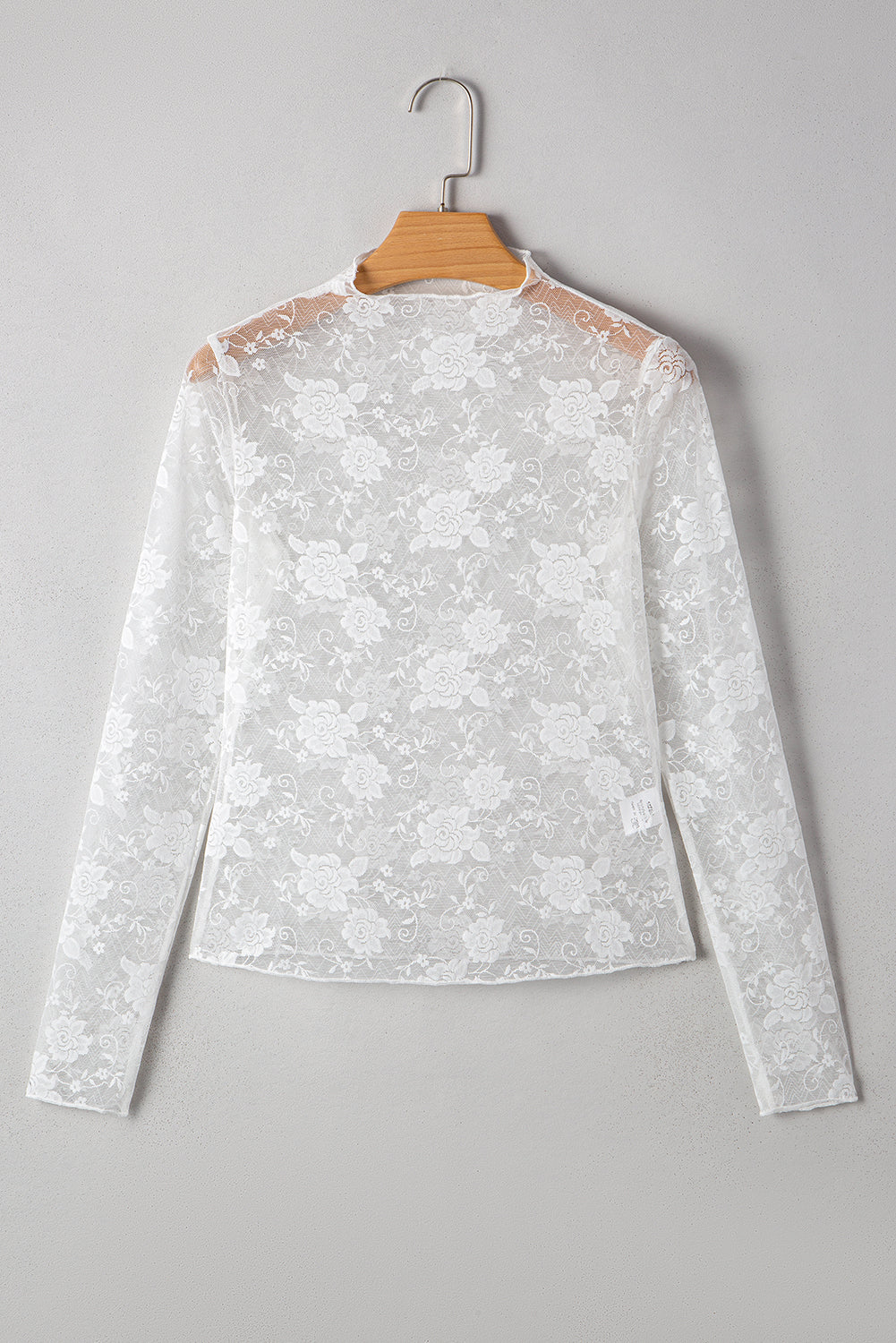 Top met col bloemenkant mesh en lange mouwen