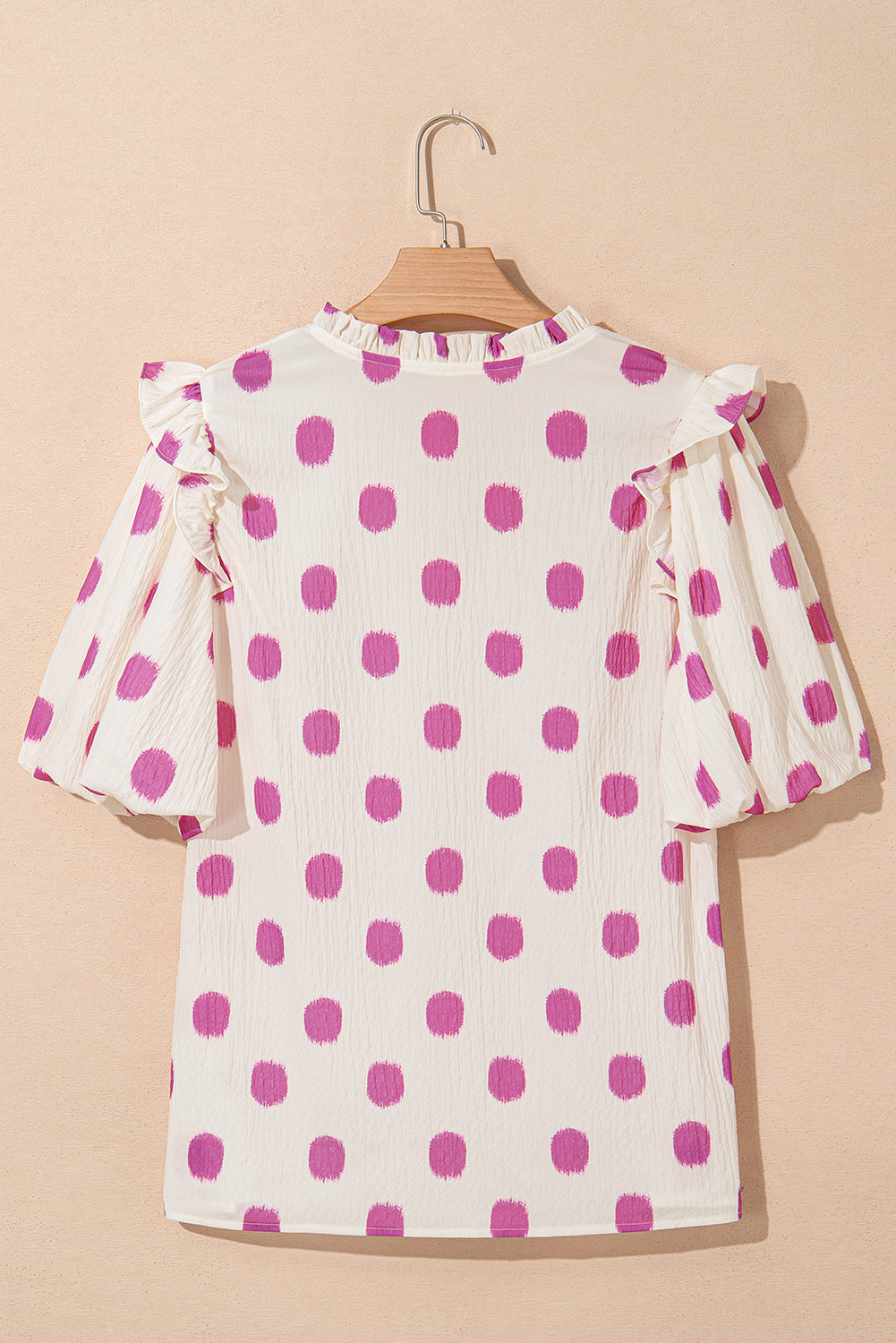 Blouse met stippenprint gesmokte halslijn en korte ballonmouwen