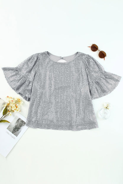 Grijze mesh blouse met ruchesmouwen en pailletten
