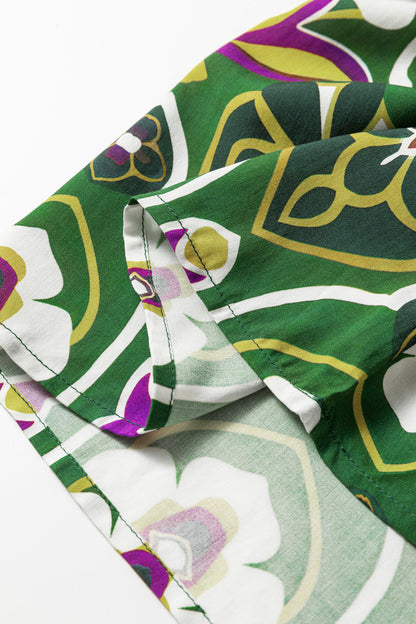 Groene midi-jurk in grote maten met gemengde bloemenpatchwork V-hals en 3/4 pofmouwen
