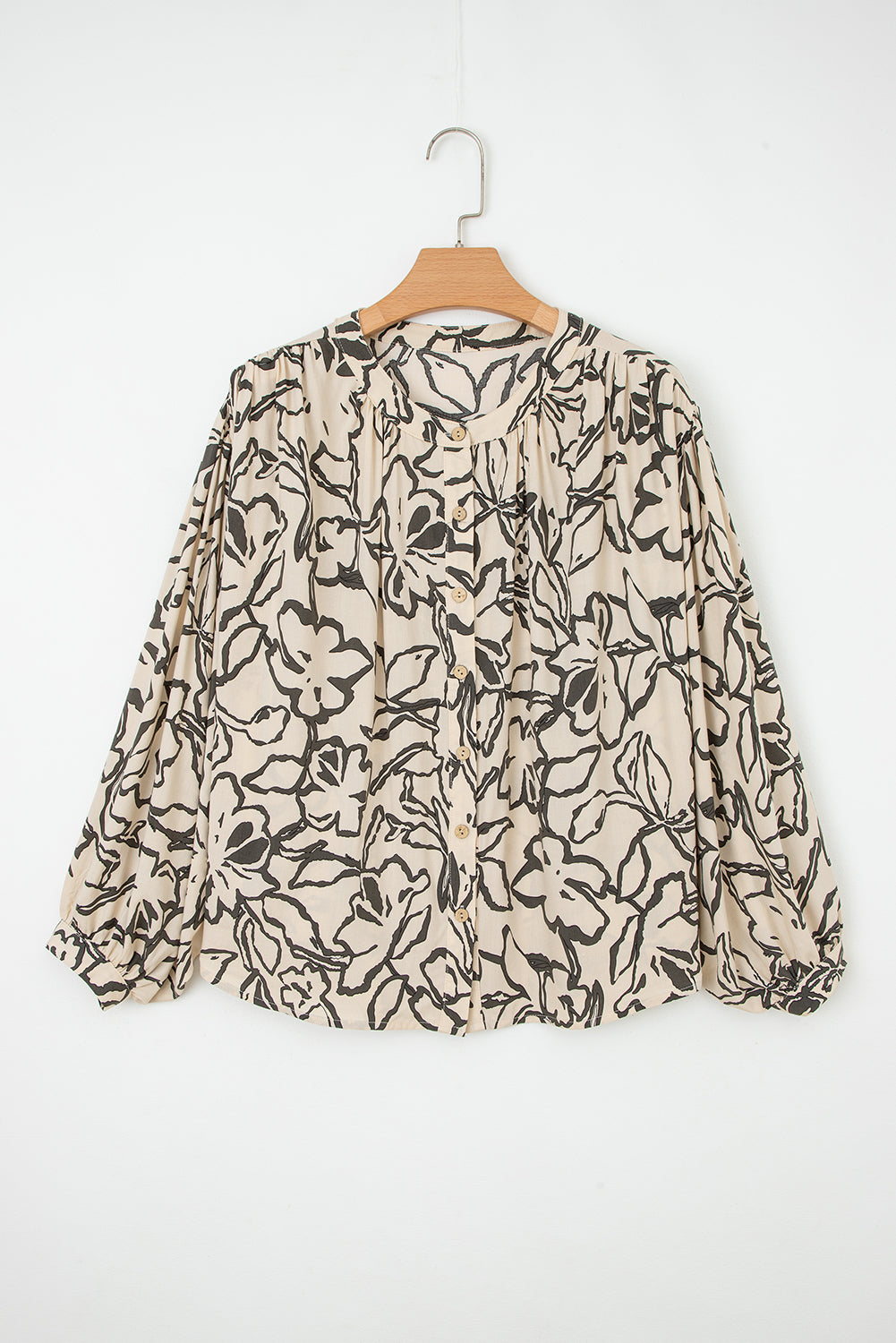 Losse blouse met bloemenprint vleermuismouwen en knoopsluiting