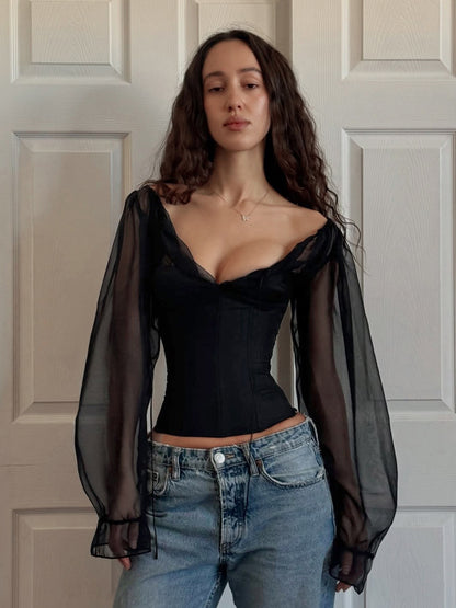 Dames top met lange mouwen van mesh  open rug met vetersluiting slim fit model