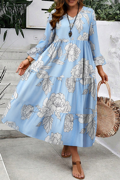 Hemelsblauwe maxi-jurk met bloemenprint wijde mouwen V-hals en ruches plus size