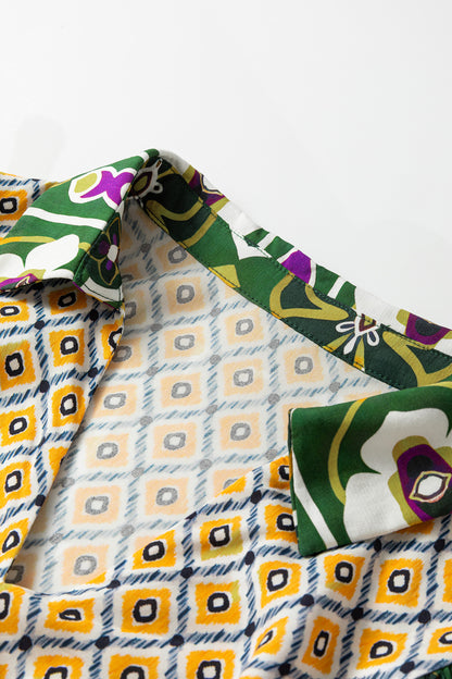 Groene midi-jurk in grote maten met gemengde bloemenpatchwork V-hals en 3/4 pofmouwen
