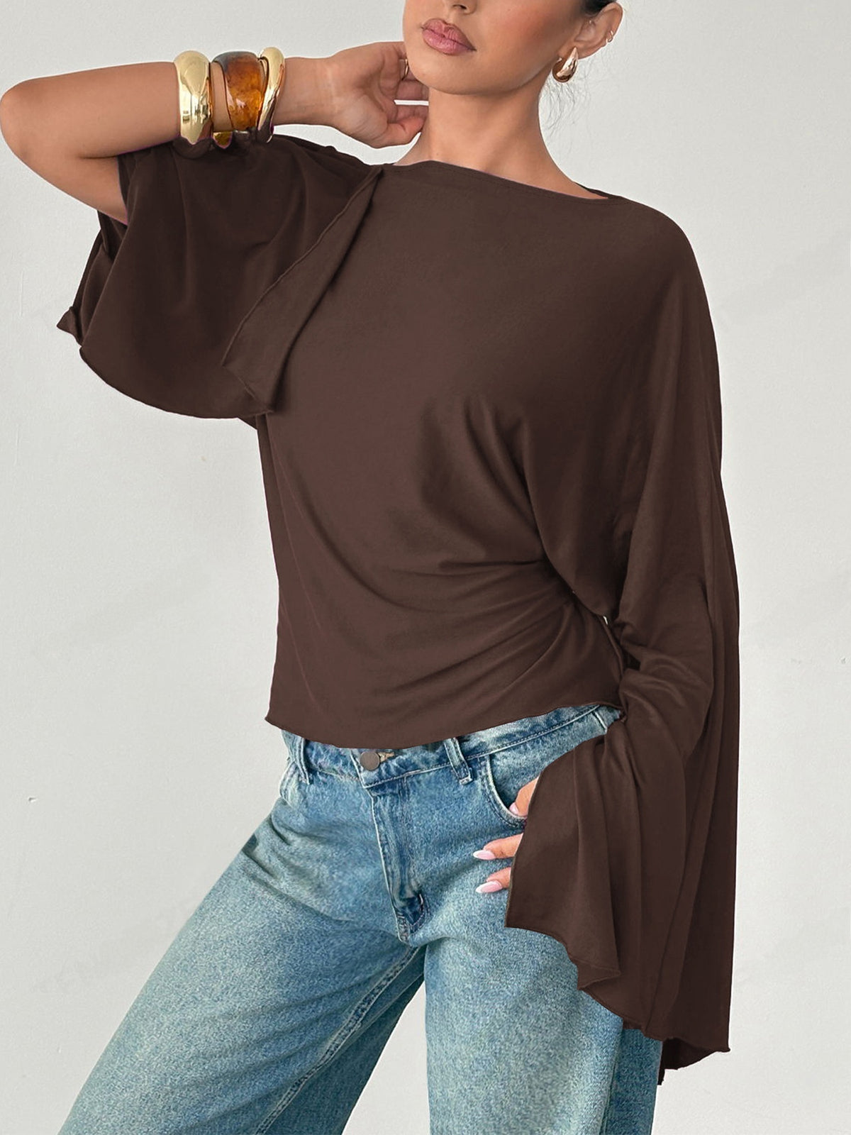 Casual gebreide slim fit top met lange wijde mouwen en strik op de rug