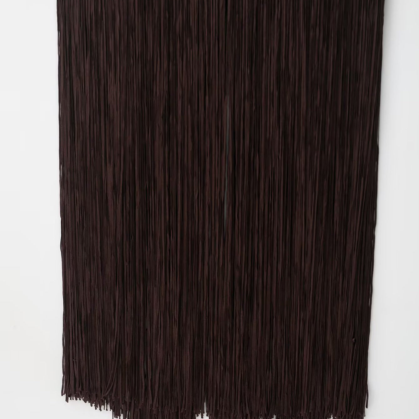 Retro jurk met kwastjes en open rug