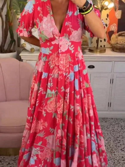 Lange jurk met bloemenprint en V-hals en elastische taille