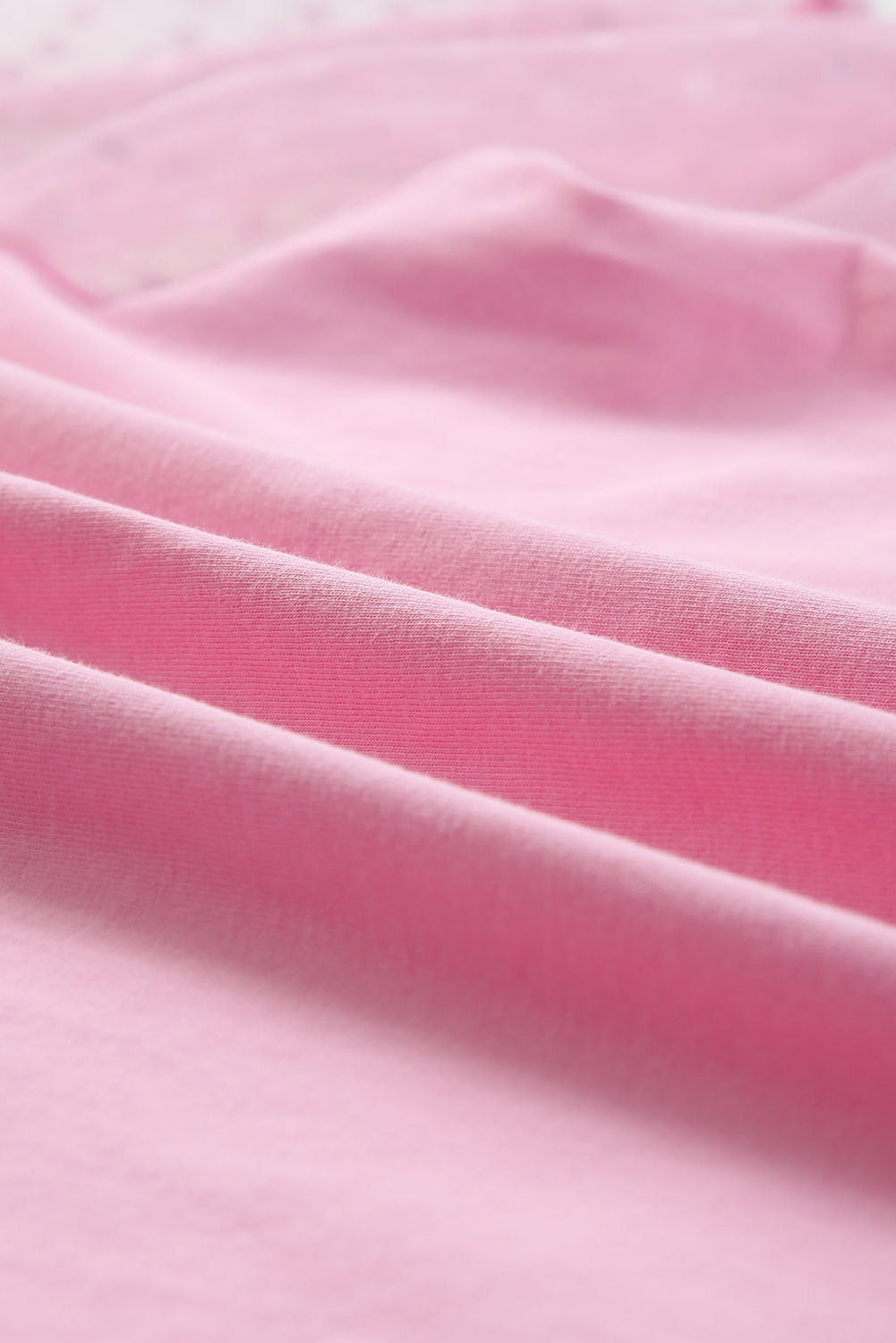 Roze top van tule met pofmouwen