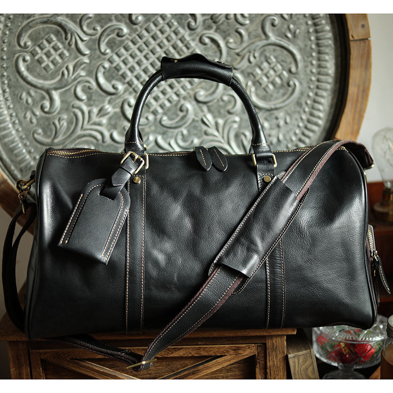 A men's hand-held outdoor camping travel bag made of cowhide