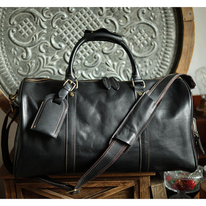 A men's hand-held outdoor camping travel bag made of cowhide