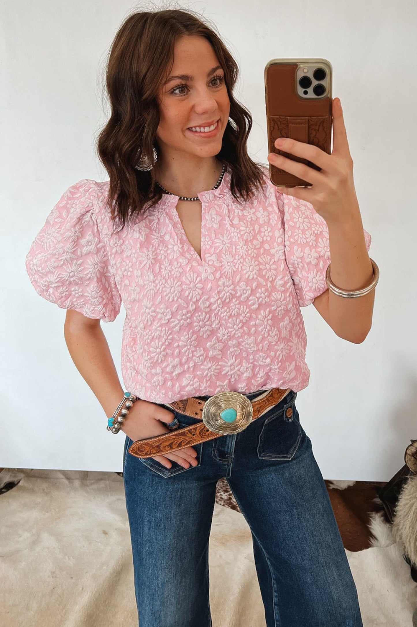 Blouse met pofmouwen en bloemenprint in abrikoosroze jacquardstof