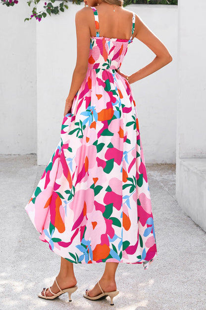 Roze zomerjurk met bloemenprint verstelbare bandjes smokwerk en hoge taille