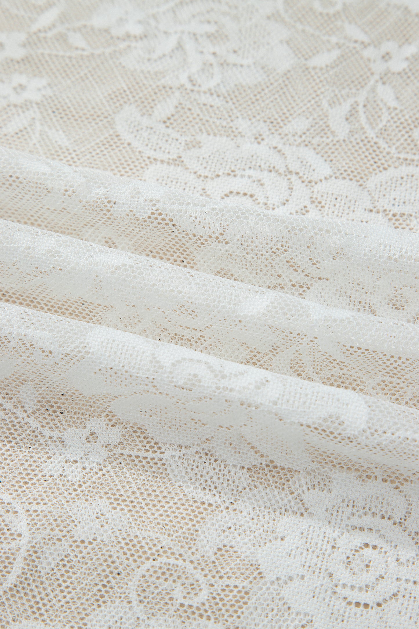 Top met lange mouwen en bloemenprint van mesh in grote maten